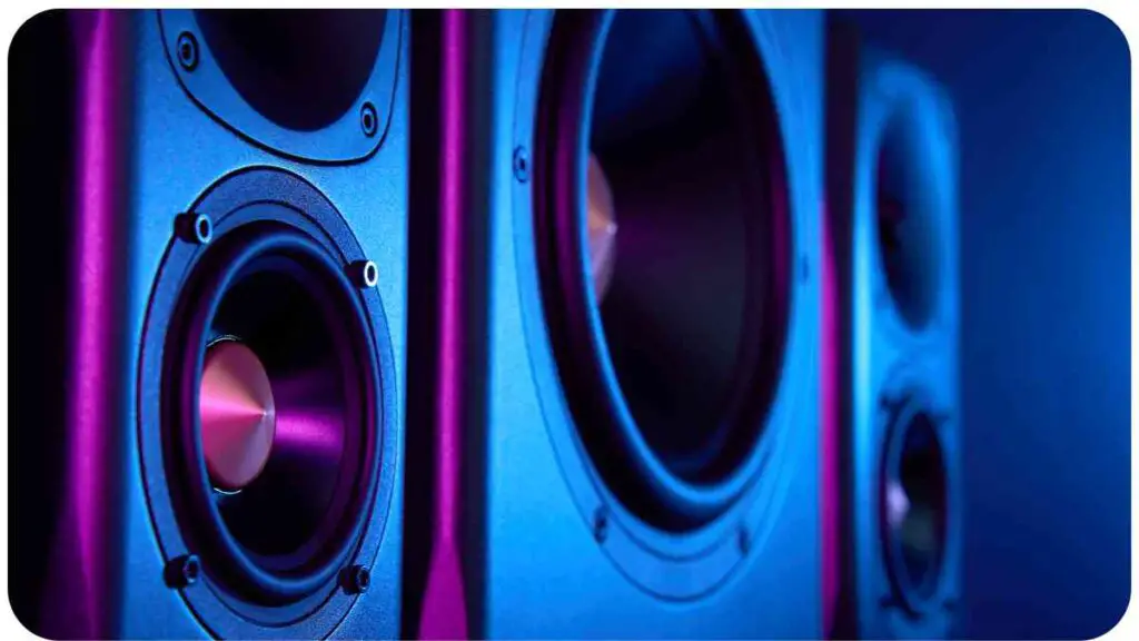 a close up of a pair of speakers in a dark room